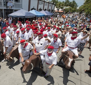 Festival attractions include the offbeat "Running of the Bulls". Image: Andy Newman